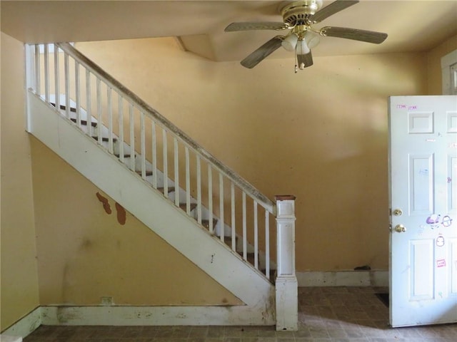 546 Ridge Ave, New Kensington, PA 15068 - staircase featuring a ceiling fan and baseboards