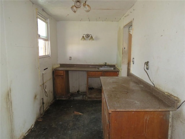 546 Ridge Ave, New Kensington, PA 15068 - kitchen with brown cabinets and a sink