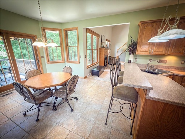 121 Covington Dr, Center Twp, PA 16001 - dining room with light tile patterned floors and baseboards