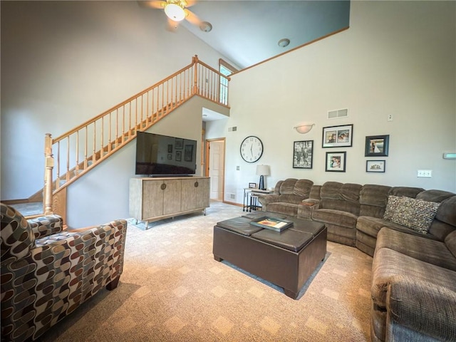 121 Covington Dr, Center Twp, PA 16001 - living area featuring high vaulted ceiling, carpet floors, ceiling fan, and stairs