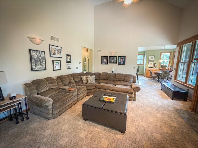 121 Covington Dr, Center Twp, PA 16001 - living room with a towering ceiling, carpet, and a ceiling fan