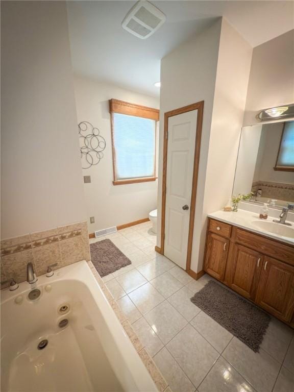 121 Covington Dr, Center Twp, PA 16001 - full bath featuring a jetted tub, vanity, and tile patterned floors