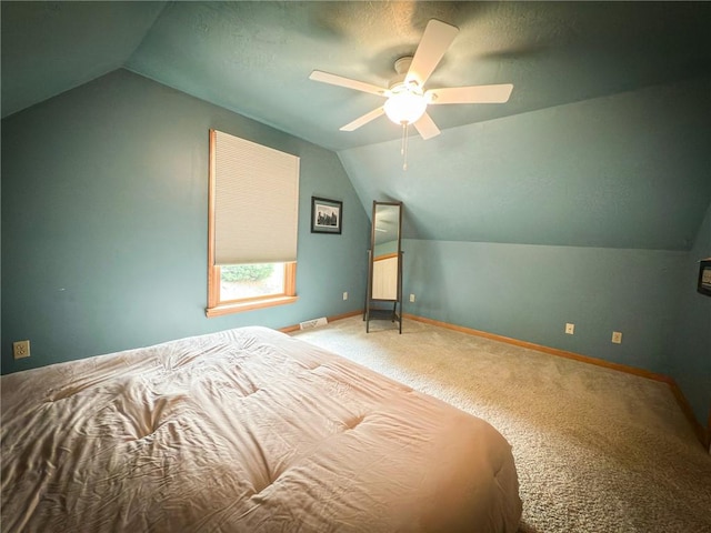 121 Covington Dr, Center Twp, PA 16001 - carpeted bedroom featuring vaulted ceiling and a ceiling fan