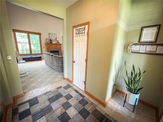 121 Covington Dr, Center Twp, PA 16001 - corridor featuring carpet and tile patterned floors