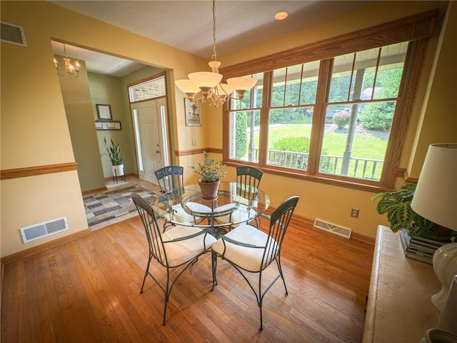 121 Covington Dr, Center Twp, PA 16001 - dining area with a chandelier and light wood finished floors