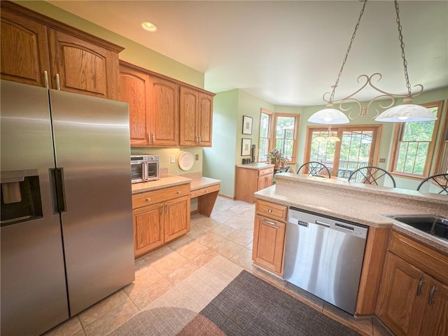 121 Covington Dr, Center Twp, PA 16001 - kitchen with appliances with stainless steel finishes, brown cabinetry, and recessed lighting