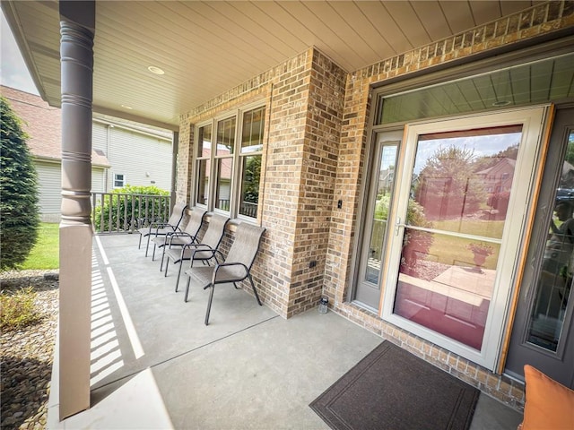 121 Covington Dr, Center Twp, PA 16001 - entrance to property with a porch and brick siding