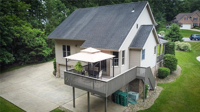 121 Covington Dr, Center Twp, PA 16001 - back of property featuring a lawn, a wooden deck, a gazebo, roof with shingles, and stairway