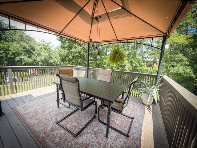 121 Covington Dr, Center Twp, PA 16001 - wooden terrace with outdoor dining space, a gazebo, and view of scattered trees
