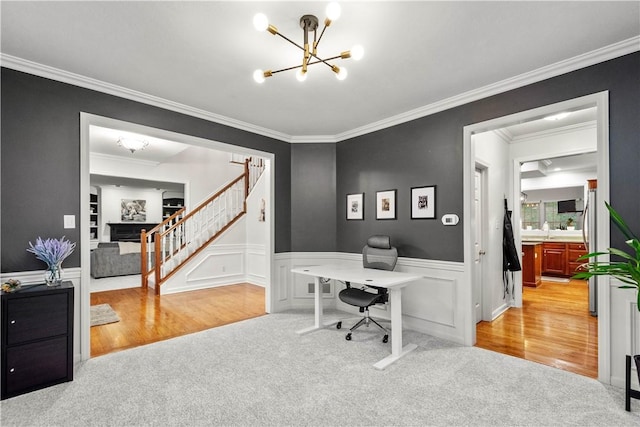 3001 Willowbrook Dr, South Fayette, PA 15017 - home office featuring a chandelier, crown molding, carpet flooring, a wainscoted wall, and wood finished floors