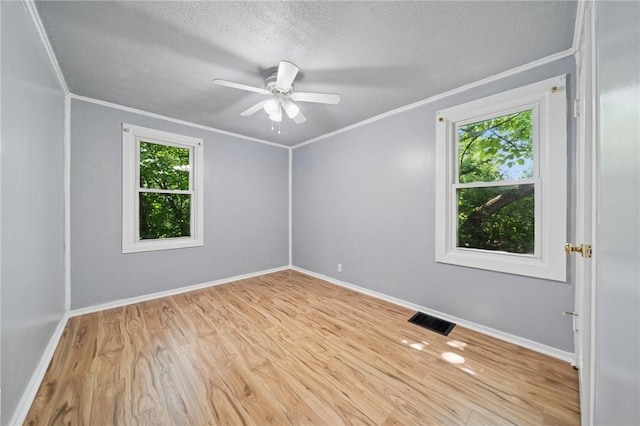 203 Clever Ave, Mckees Rocks, PA 15136 - empty room with light wood finished floors, ornamental molding, a textured ceiling, and a ceiling fan