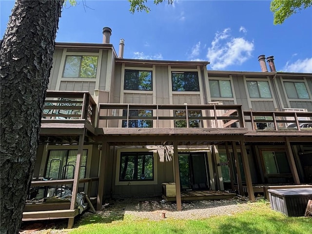 13 Lakeview Dr, Hidden Valley, PA 15502 - back of house with board and batten siding and a deck