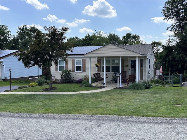 734 Vanderbilt Dr, Monroeville, PA 15146 - view of front of house featuring roof mounted solar panels and covered porch