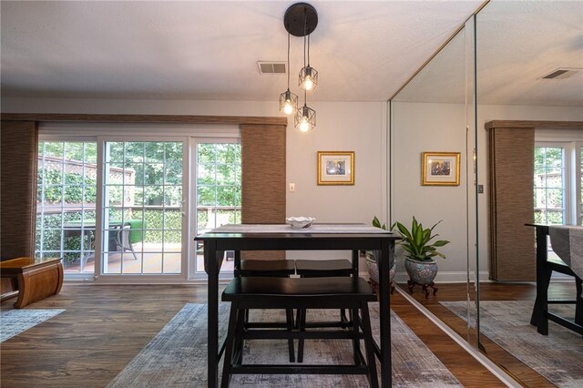 549 Brandywine Dr, Cranberry Twp, PA 16066 - dining space with dark wood-style floors and baseboards
