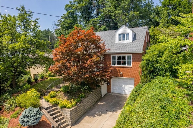 6826 Church Ave, Ben Avon, PA 15202 - view of front of home featuring concrete driveway, a garage, and brick siding
