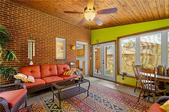 6826 Church Ave, Ben Avon, PA 15202 - living area with wood ceiling, brick wall, ceiling fan, and french doors