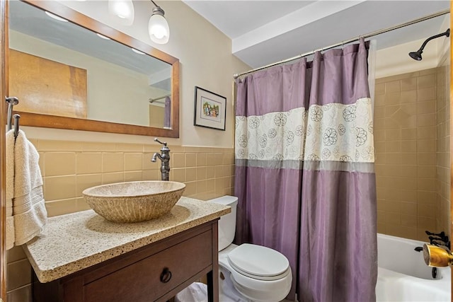 6826 Church Ave, Ben Avon, PA 15202 - bathroom featuring shower / bathtub combination with curtain, vanity, tile walls, and wainscoting