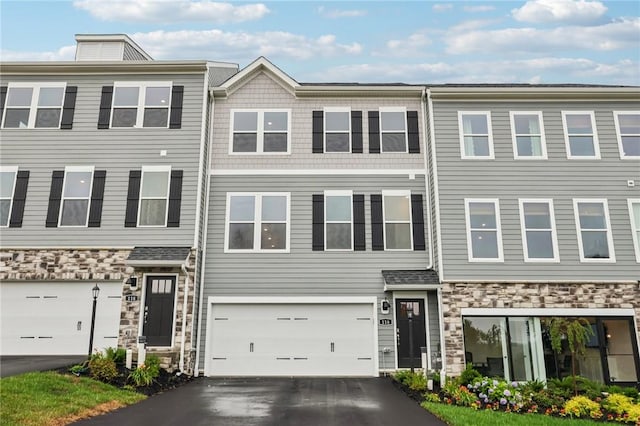 116 River Ridge Drive, Moon/Crescent Twp, PA 15108 - multi unit property with stone siding, driveway, and a garage