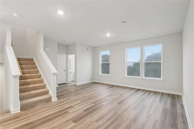 116 River Ridge Drive, Moon/Crescent Twp, PA 15108 - unfurnished living room with light wood finished floors, stairway, and recessed lighting