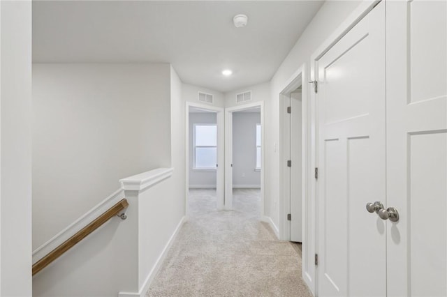 116 River Ridge Drive, Moon/Crescent Twp, PA 15108 - hall featuring light colored carpet and an upstairs landing