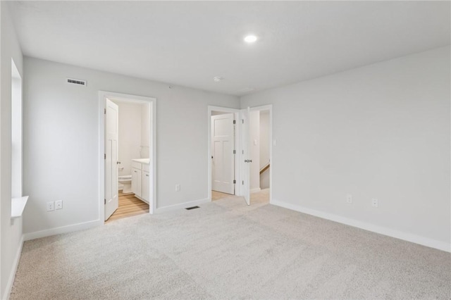 116 River Ridge Drive, Moon/Crescent Twp, PA 15108 - unfurnished bedroom featuring light colored carpet, ensuite bathroom, and recessed lighting