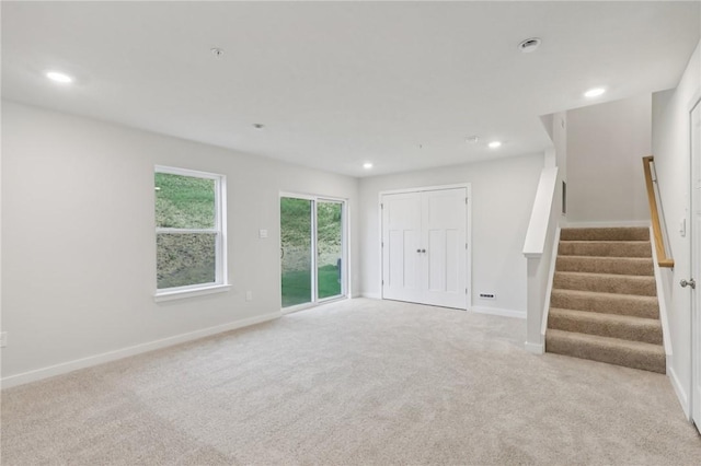 116 River Ridge Drive, Moon/Crescent Twp, PA 15108 - unfurnished living room with carpet floors, recessed lighting, and stairway