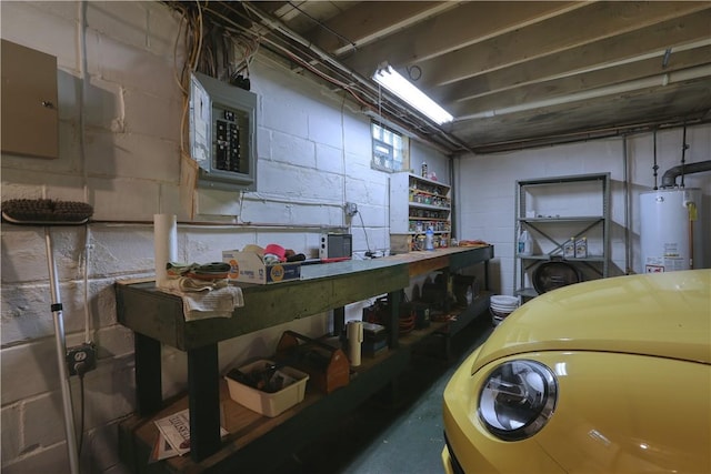 267 Blackhawk Rd, Chippewa Twp, PA 15010 - garage featuring water heater, a workshop area, washer / clothes dryer, and electric panel