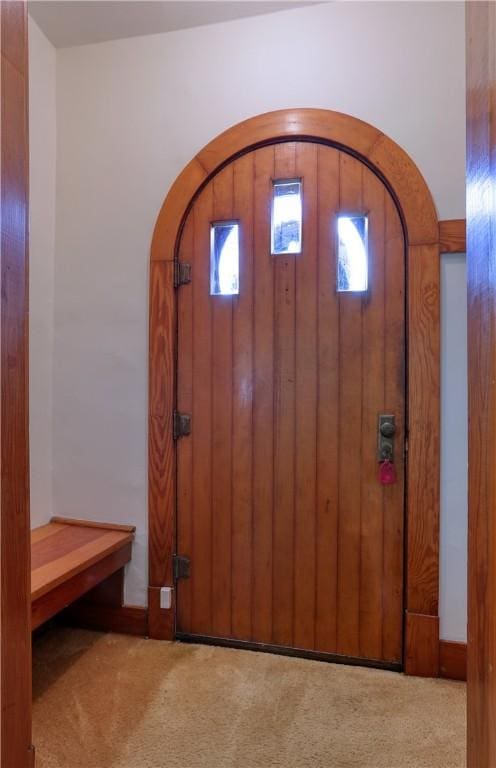 267 Blackhawk Rd, Chippewa Twp, PA 15010 - foyer with arched walkways and carpet flooring