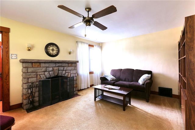267 Blackhawk Rd, Chippewa Twp, PA 15010 - carpeted living room featuring a ceiling fan and a fireplace