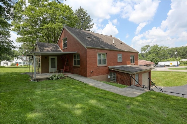 267 Blackhawk Rd, Chippewa Twp, PA 15010 - rear view of property featuring brick siding, a lawn, a shingled roof, and covered porch