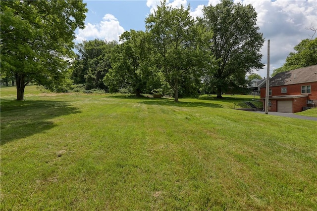 267 Blackhawk Rd, Chippewa Twp, PA 15010 - view of grassy yard with an attached garage