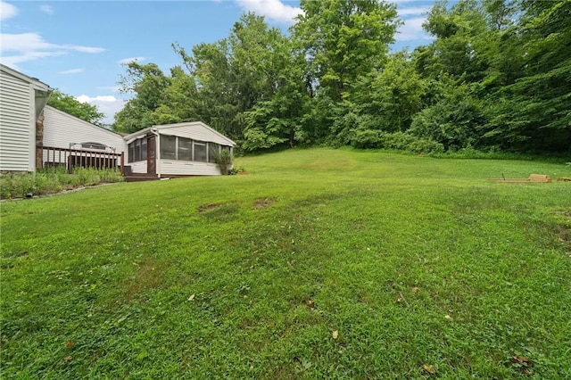 128 Honey Suckle Ln, Unity Twp, PA 15601 - view of grassy yard featuring a sunroom