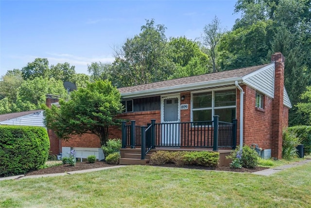 809 Sleepy Hollow Rd, Castle Shannon, PA 15234 - view of front facade with covered porch, a chimney, a front lawn, and brick siding