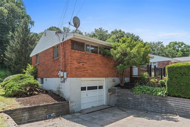 809 Sleepy Hollow Rd, Castle Shannon, PA 15234 - view of front of home with a garage, concrete driveway, and brick siding