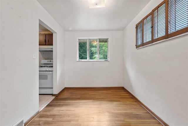 809 Sleepy Hollow Rd, Castle Shannon, PA 15234 - unfurnished dining area featuring plenty of natural light and light wood-type flooring
