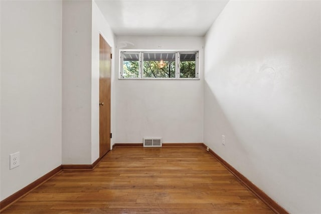 809 Sleepy Hollow Rd, Castle Shannon, PA 15234 - spare room featuring wood finished floors and baseboards