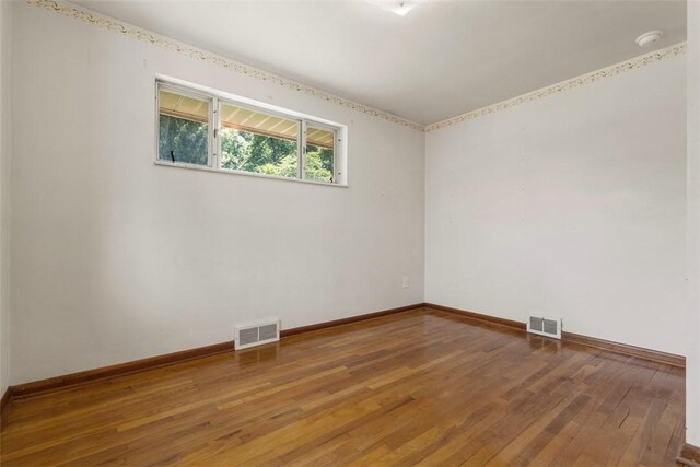 809 Sleepy Hollow Rd, Castle Shannon, PA 15234 - spare room with hardwood / wood-style floors and a smoke detector