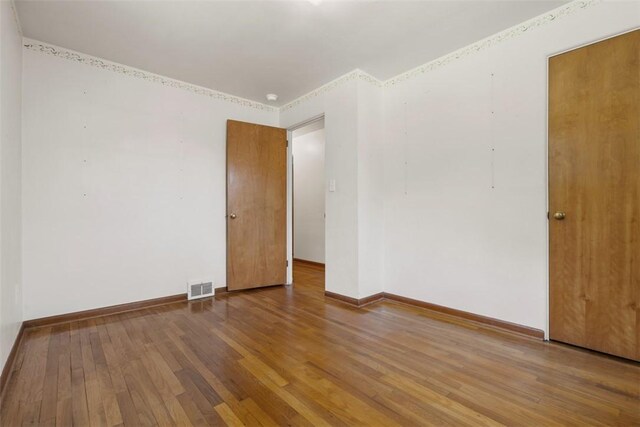 809 Sleepy Hollow Rd, Castle Shannon, PA 15234 - empty room with wood finished floors and baseboards