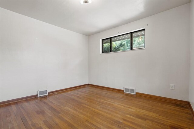 809 Sleepy Hollow Rd, Castle Shannon, PA 15234 - unfurnished room featuring hardwood / wood-style flooring and baseboards