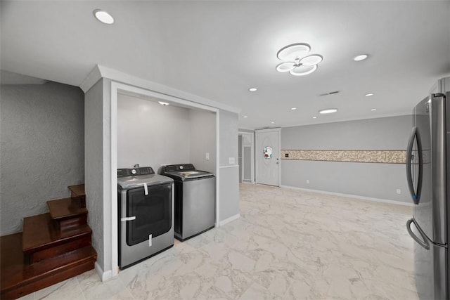 146 Mill St, Penn Hills, PA 15147 - laundry room featuring independent washer and dryer, light marble finish flooring, and recessed lighting