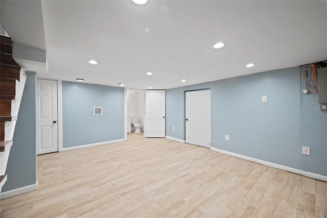 146 Mill St, Penn Hills, PA 15147 - finished below grade area with recessed lighting, light wood-type flooring, and stairway