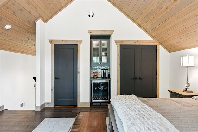 50 Hawes Rd, Wharton Twp, PA 15437 - bedroom with beverage cooler, vaulted ceiling, wooden ceiling, dark wood finished floors, and bar area