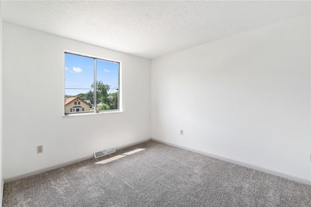 404 Beulah St, Shaler, PA 15209 - spare room with carpet and a textured ceiling