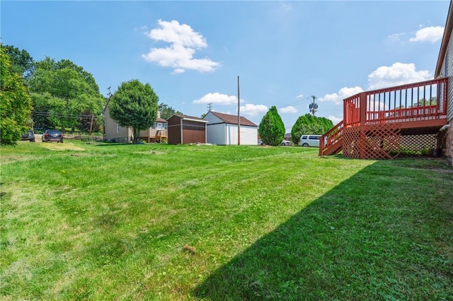 404 Beulah St, Shaler, PA 15209 - view of grassy yard with a wooden deck and a storage shed