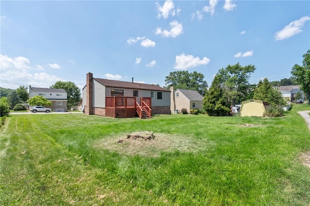 404 Beulah St, Shaler, PA 15209 - back of house with a deck, a yard, a shed, a chimney, and stairway