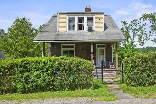 11839 Crockett St, North Huntingdon, PA 15647 - view of front of property with covered porch, a gate, and a chimney