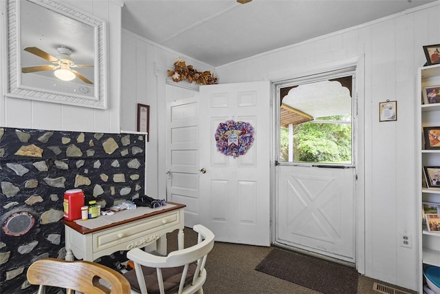11839 Crockett St, North Huntingdon, PA 15647 - entryway featuring crown molding, dark colored carpet, and ceiling fan