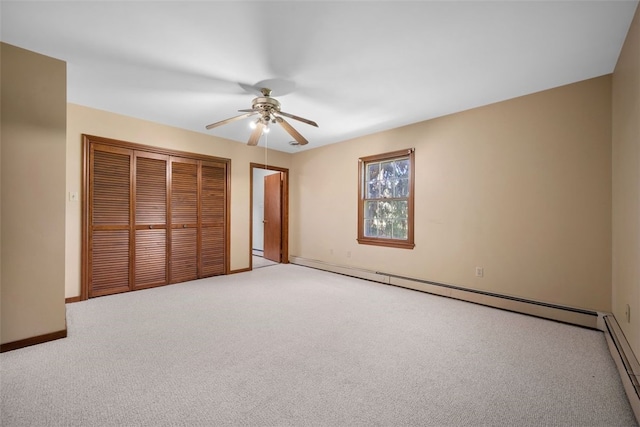 904-906 Blackburn Rd, Sewickley Heights, PA 15143 - unfurnished bedroom featuring a baseboard heating unit, a closet, and carpet