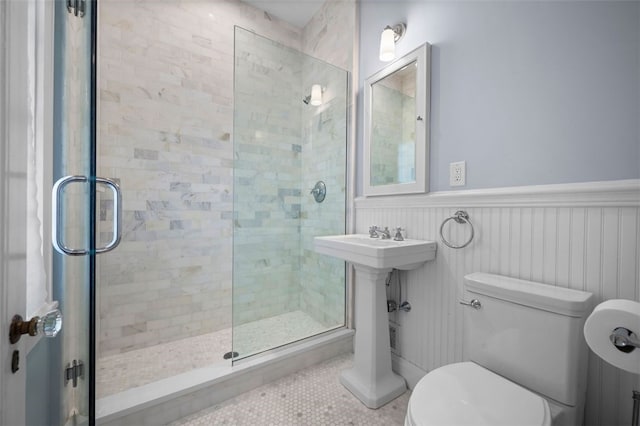 904-906 Blackburn Rd, Sewickley Heights, PA 15143 - bathroom with a shower stall, wainscoting, and tile patterned flooring