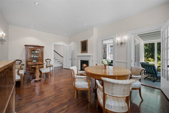 904-906 Blackburn Rd, Sewickley Heights, PA 15143 - dining room featuring dark wood-style flooring, stairs, a warm lit fireplace, and recessed lighting